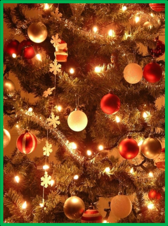 Festive Christmas image with greenery, lights and ornaments